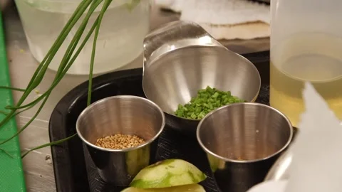 Different condiments in small metal containers Stock-Footage 307339967