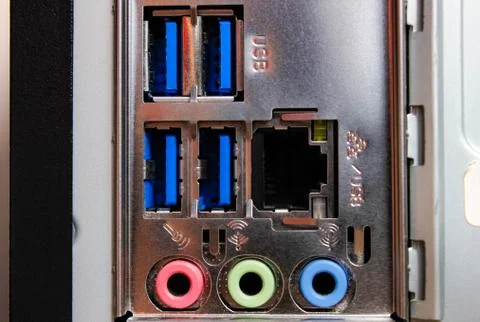 Different connectors on the back of the computer's system unit. Stock-Fotos