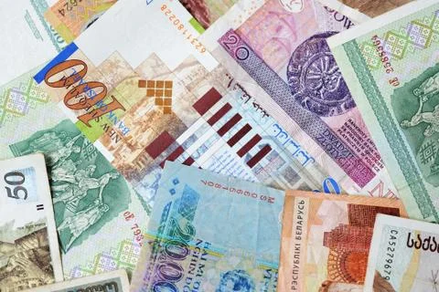 Different countries money background close up. Belarusian rubles, Georgian la Stock Photos