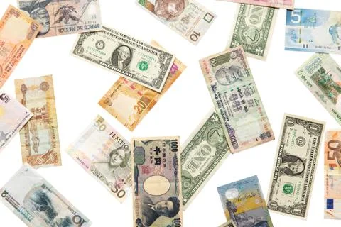 Different currencies falling down Stock Photos