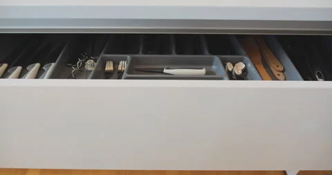 Different cutlery in kitchen drawer Stock Footage 144570201