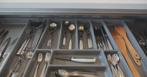 Different cutlery in kitchen drawer Stock Footage 144571674