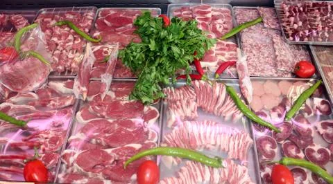 Different Cuts of Fresh Raw Red Meat in a Supermarket Stock Photos
