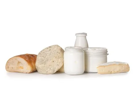 Different dairy products with bread on white background Stock Photos