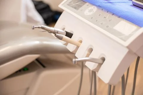 Different dental instruments and tools in a dentists office. Closeup of Denti Stock Photos