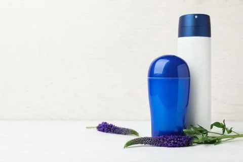 Different deodorants on light background 스톡 사진
