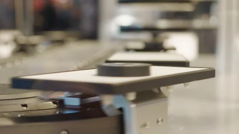 Different details on conveyor belt of automatic test set Stock Footage 105605202