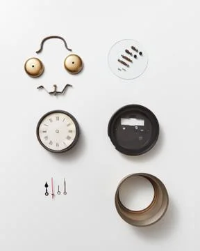 Different details of an old mechanical clock and a smiling face made from Stock Photos