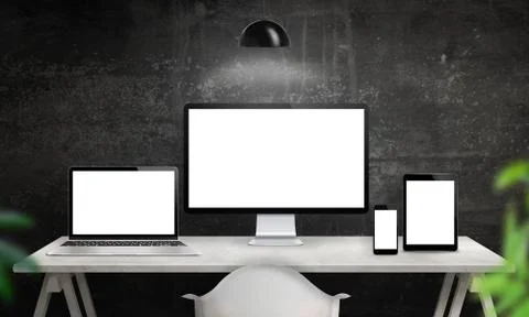 Different devices on desk with isolated screen for responsive web site design Stock Photos