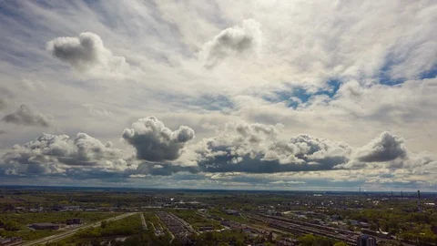 Different directions fast moving clouds. 4k aerial timelapse hyperlapse Stock Footage 112771843
