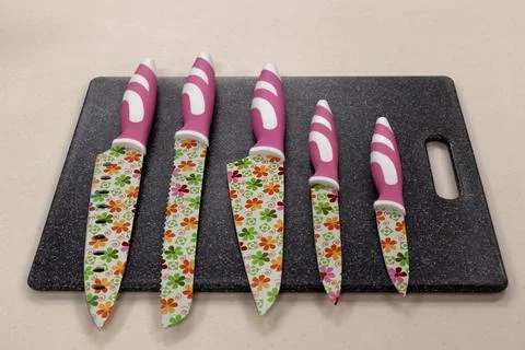 Different dishes in the kitchen, various kitchen utensils on table, in the ki Stock Photos