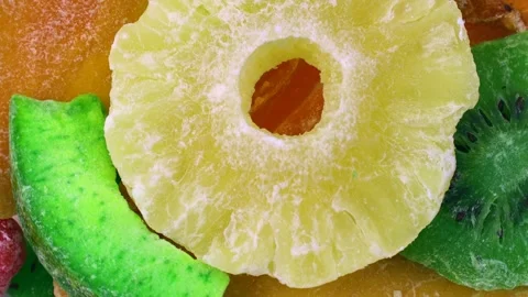Different dried candied fruit with sugar circle rotation close up top view Stock Footage 270477927