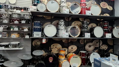 Different drums in music instruments store. Drum sets in displayed in music.. Stock Footage 342616846
