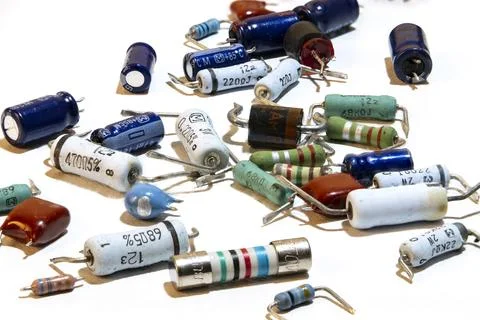 Different electronic components, resistors, capacitors, semiconductors, dio.. Stock Photos
