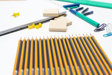 Different elements or essential school supplies such as pencils, erasers and  Stock Photos