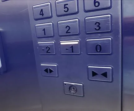 Different elevators buttons in modern metal lift Stock Photos