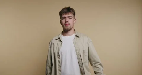 Different emotions portrayed by a man in a creative setup, capturing the ra.. Видео 329113144