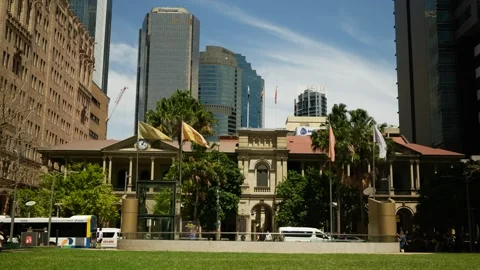 Different eras of Brisbane architecture in the city on summers day 6K Stock Footage 329080943