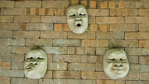 Different expression mask on the wall 02 Stock Photos