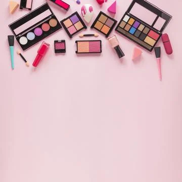 Different eye shadows with nail polish table Stock Photos