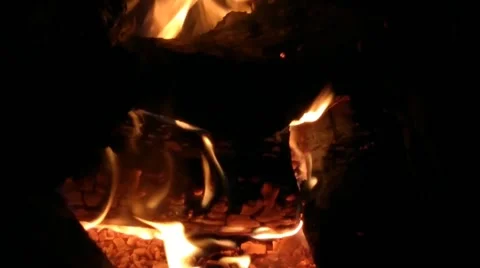 Different firewood in the fireplace with fire Stock Footage 171219582