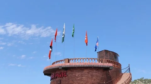 Different flags on a tower 库存影片 275045019