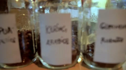 Different flavours of coffee in jars in shop shelves Stock Footage 131517574