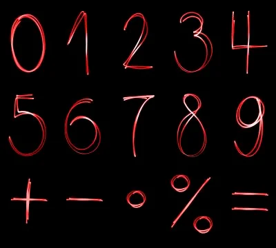 Different flourescent numbers and math symbols in red neon color Stock Illustration