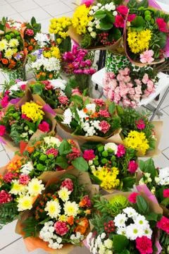Different flowers bouquets background Stock Photos