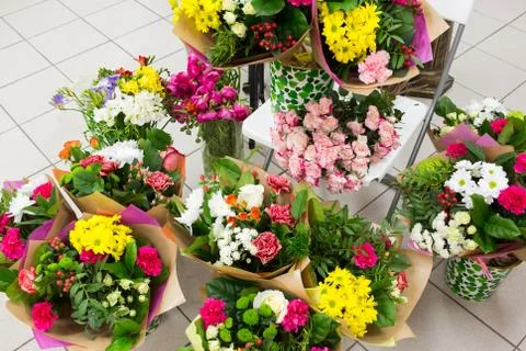 Different flowers bouquets background Stock Photos