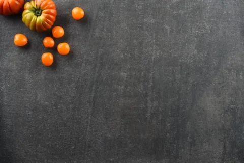 Different food and drink objects on stone and wood background Foto stock