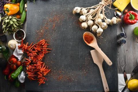 Different food and drink objects on stone and wood background Foto stock