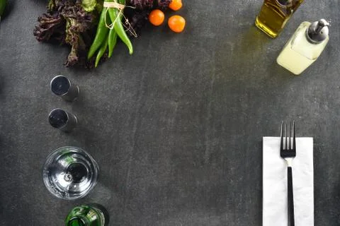 Different food and drink objects on stone and wood background Stock-Fotos