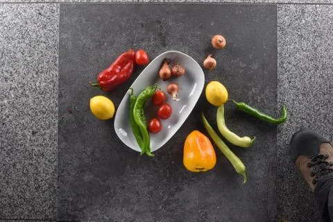 Different food and drink objects on stone and wood background Foto stock