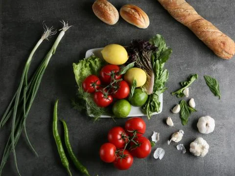 Different food and drink objects on stone and wood background Stock Photos