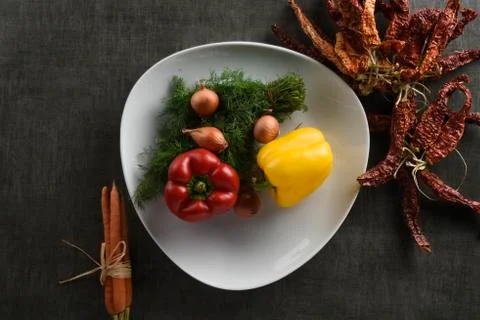 Different food and drink objects on stone and wood background Foto stock
