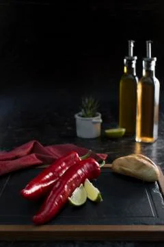 Different food and drink objects on stone and wood background Foto stock