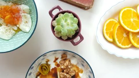 Different food and drink objects on stone and wood background Foto stock