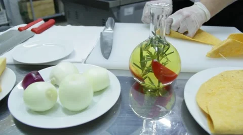 Different food ingredients on the table and cook preparing tortilas Stock Footage 48395901