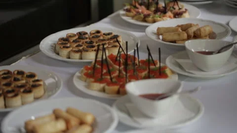 Different food on the table in the dining room. wellcome of small dishes Stock Footage 219610385
