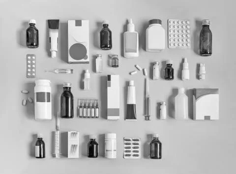 Different forms of drugs on a light background Stock Photos