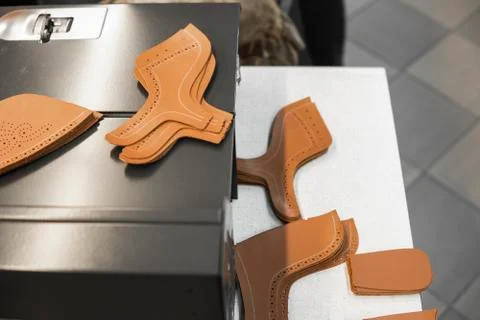 Different forms of leather pieces which will be use for making a shoes on a Stock Photos