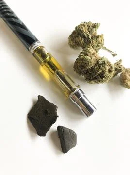 Different forms of marijuana, like resin, hash and weed, or grass Stock Photos