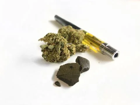 Different forms of marijuana, like resin, hash and weed, or grass Stock Photos