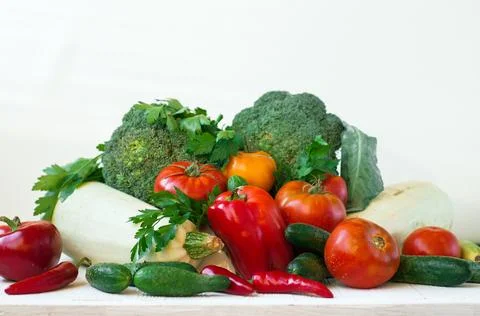 Different fresh vegetables on the table, fresh vegetables as background Stock Photos