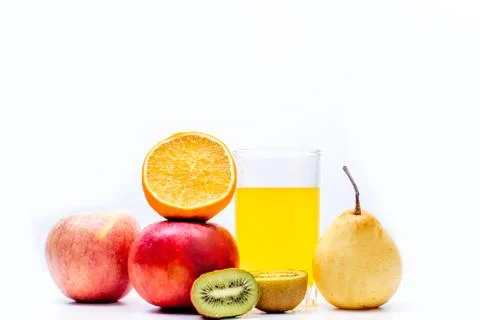 Different fruit and juice or smoothie in a glass Stock Photos