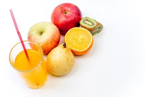 Different fruit and juice or smoothie in a glass Stock Photos