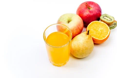 Different fruit and juice or smoothie in a glass Stock Photos