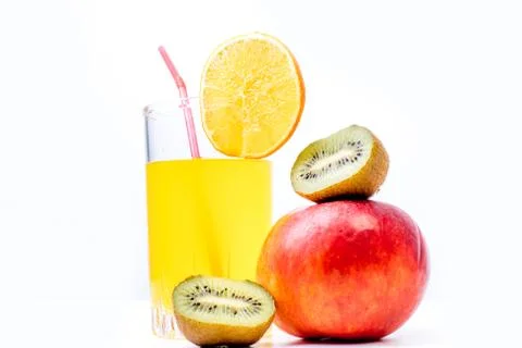 Different fruit and juice or smoothie in a glass Stock Photos