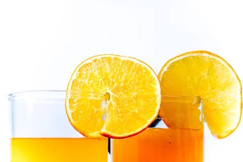 Different fruit and juice or smoothie in a glass Stock Photos